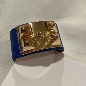 Stylish unbranded  blue  Leather gold spikes bracelet  door knocker design New